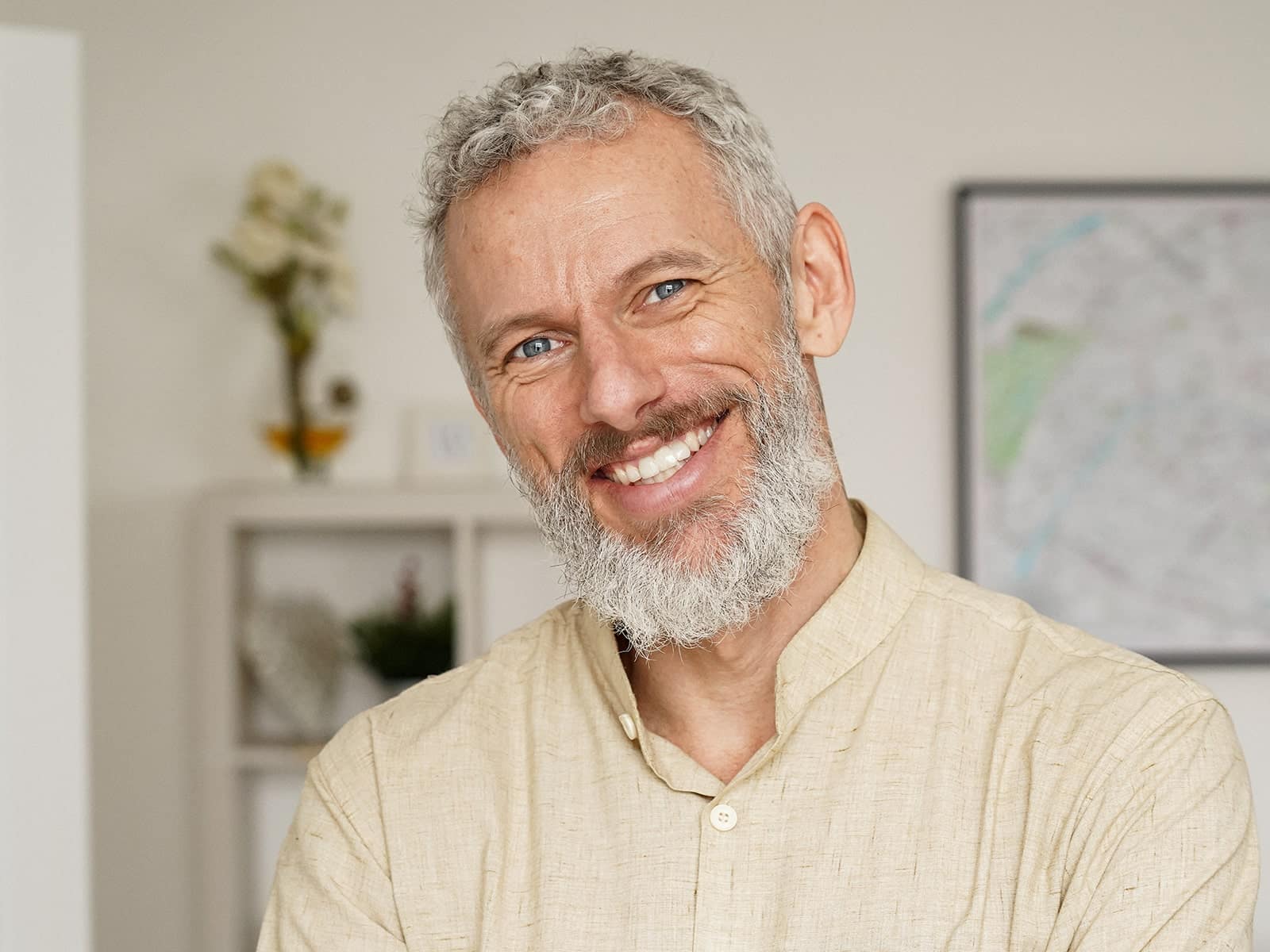 Older man in tan button down