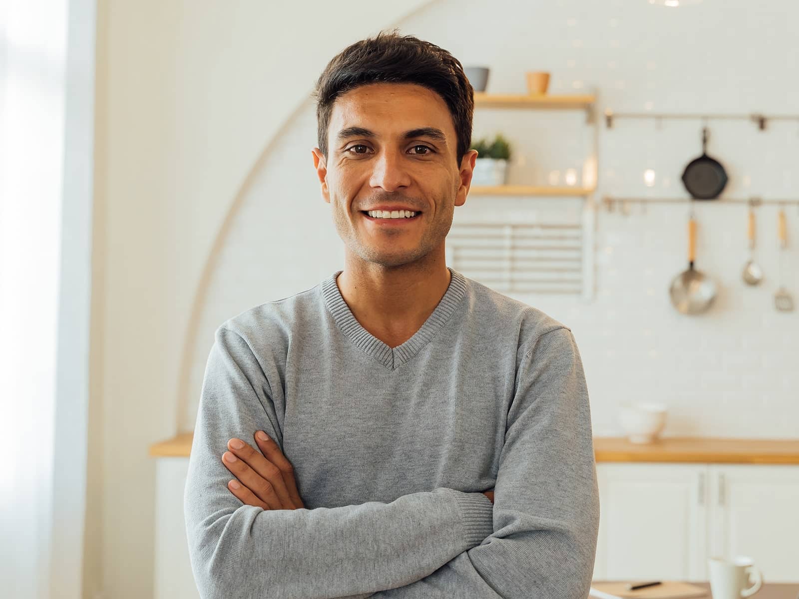 Young man in a gray sweater